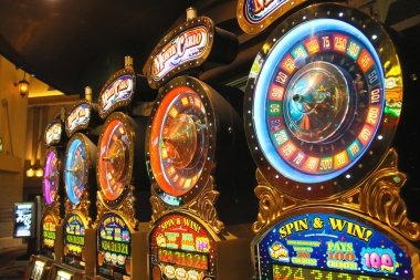 Mobile phone displaying live casino table with dealer and cards